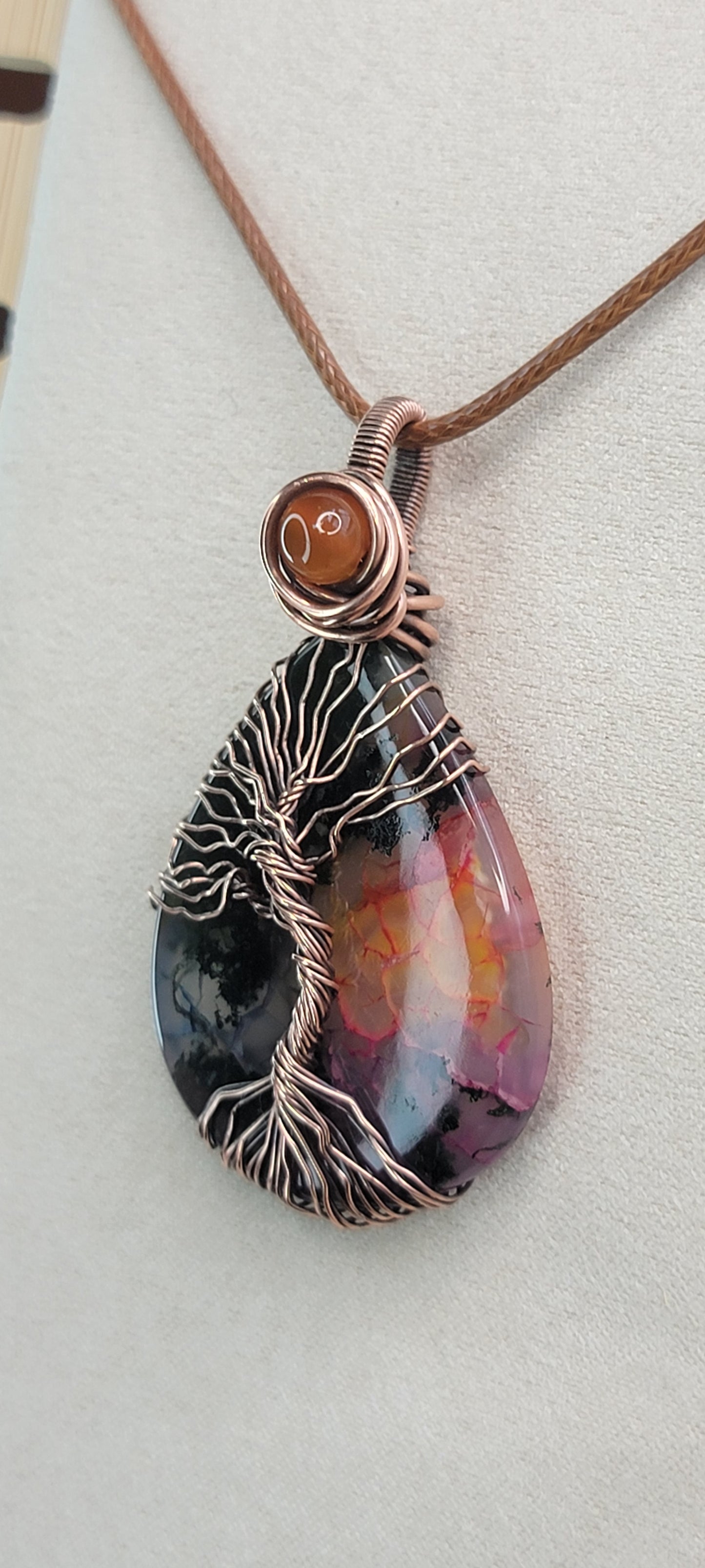 Garden Quartz ( dyed ) wrapped in copper, with carnelian accent