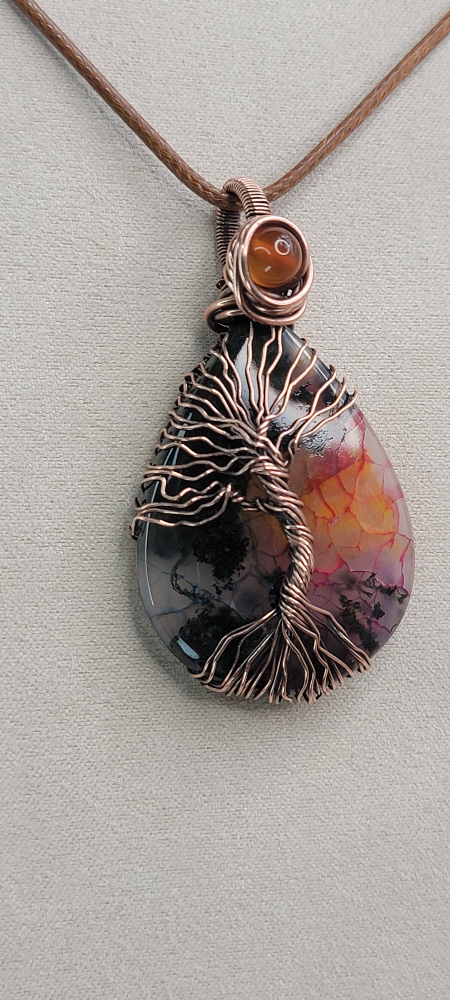 Garden Quartz ( dyed ) wrapped in copper, with carnelian accent